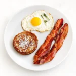 Kids Sweet Meal at Eggsquisite Cafe with French toast, waffle, or cinnamon French toast and bacon with one egg.