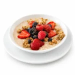 Steel Cut Oats at Eggsquisite Cafe served warm with optional berries, pecans, or granola.